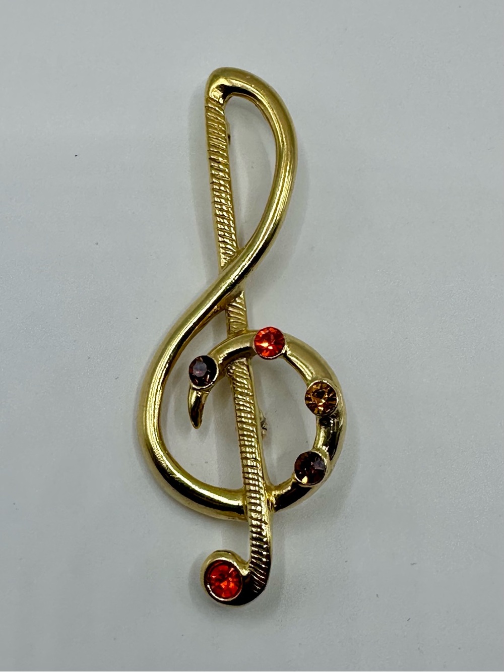 Vintage Gold-Tone Treble Clef Brooch with Jewel-Toned Rhinestones